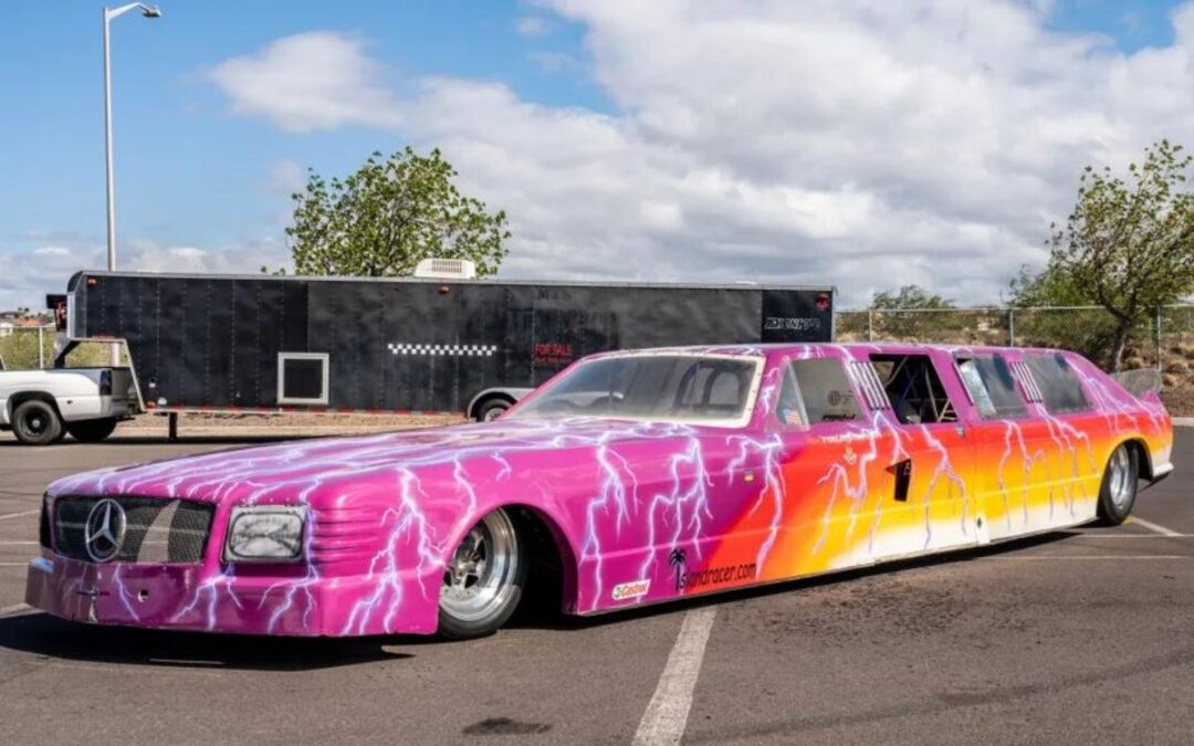 This neon-colored Mercedes limo shoots FLAMES