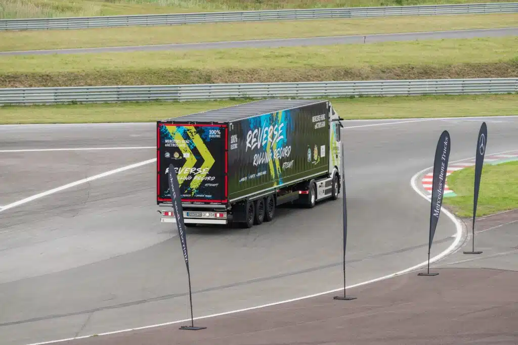 Mercedes sent Marco Hellgrewe to a racetrack in order to set the world record for reversing - and he only went and did it.