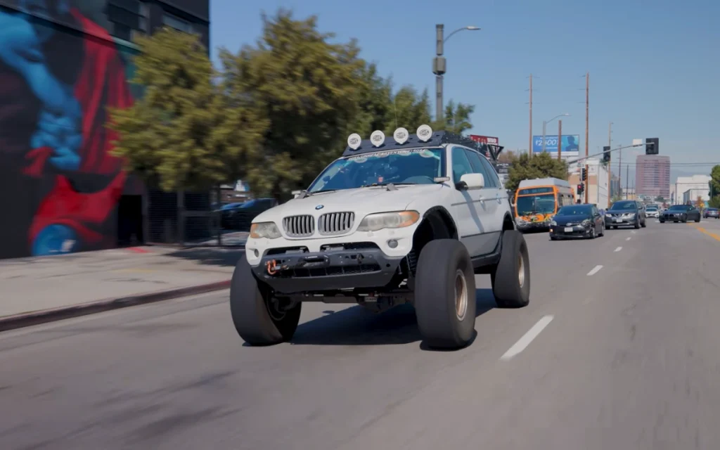 This heavily modified off-roader had once been just a regular BMW X5, the kind you’d expect to see doing school runs rather than climbing rocks.