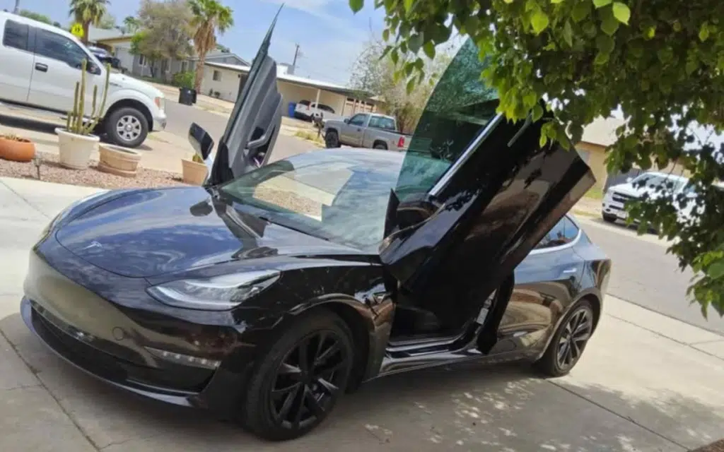Woman in Arizona is selling a modded Tesla Model 3 with scissor doors and it goes hard