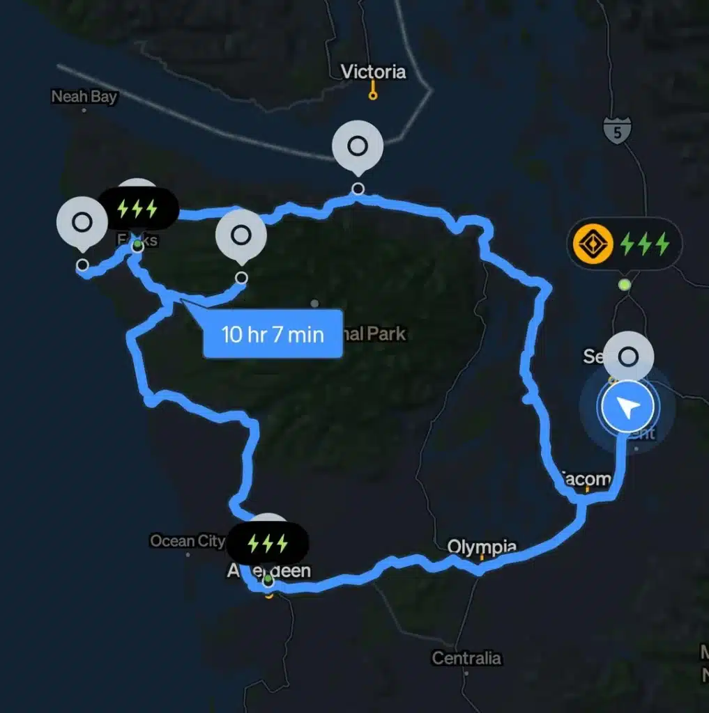 Rivian R1T completes 460-mile road trip with 7% battery remaining, using free charging network despite navigation and charger issues
