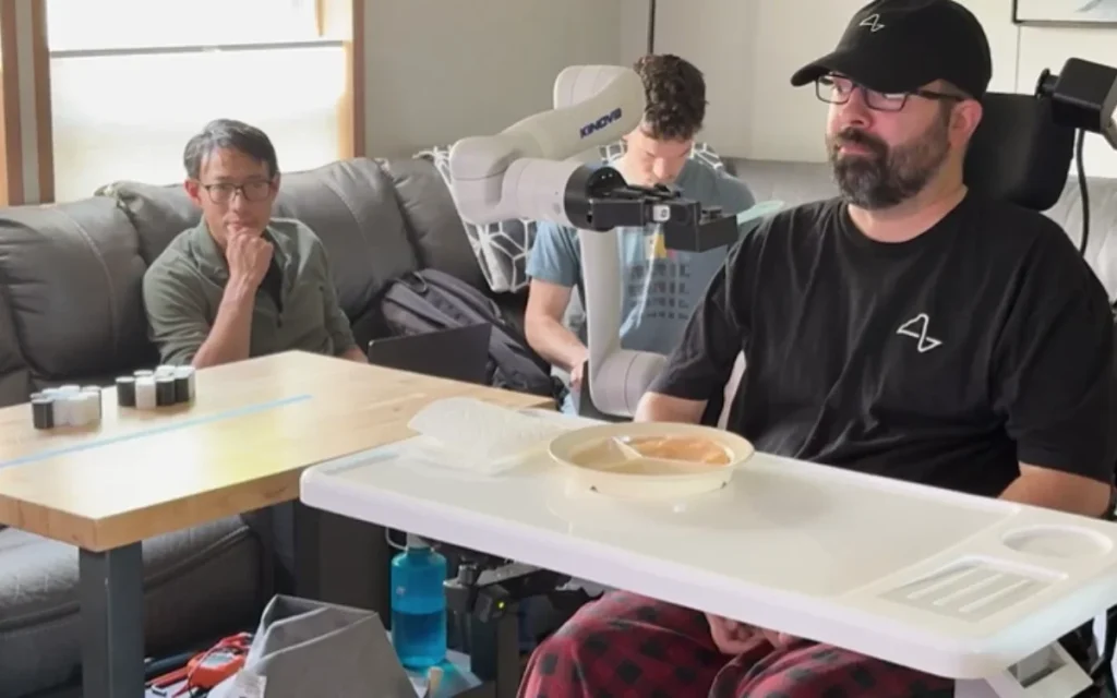 A Neuralink patient with ALS feeds himself using a brain-controlled robot arm, prompting over 10,000 new sign-ups to the company’s waitlist