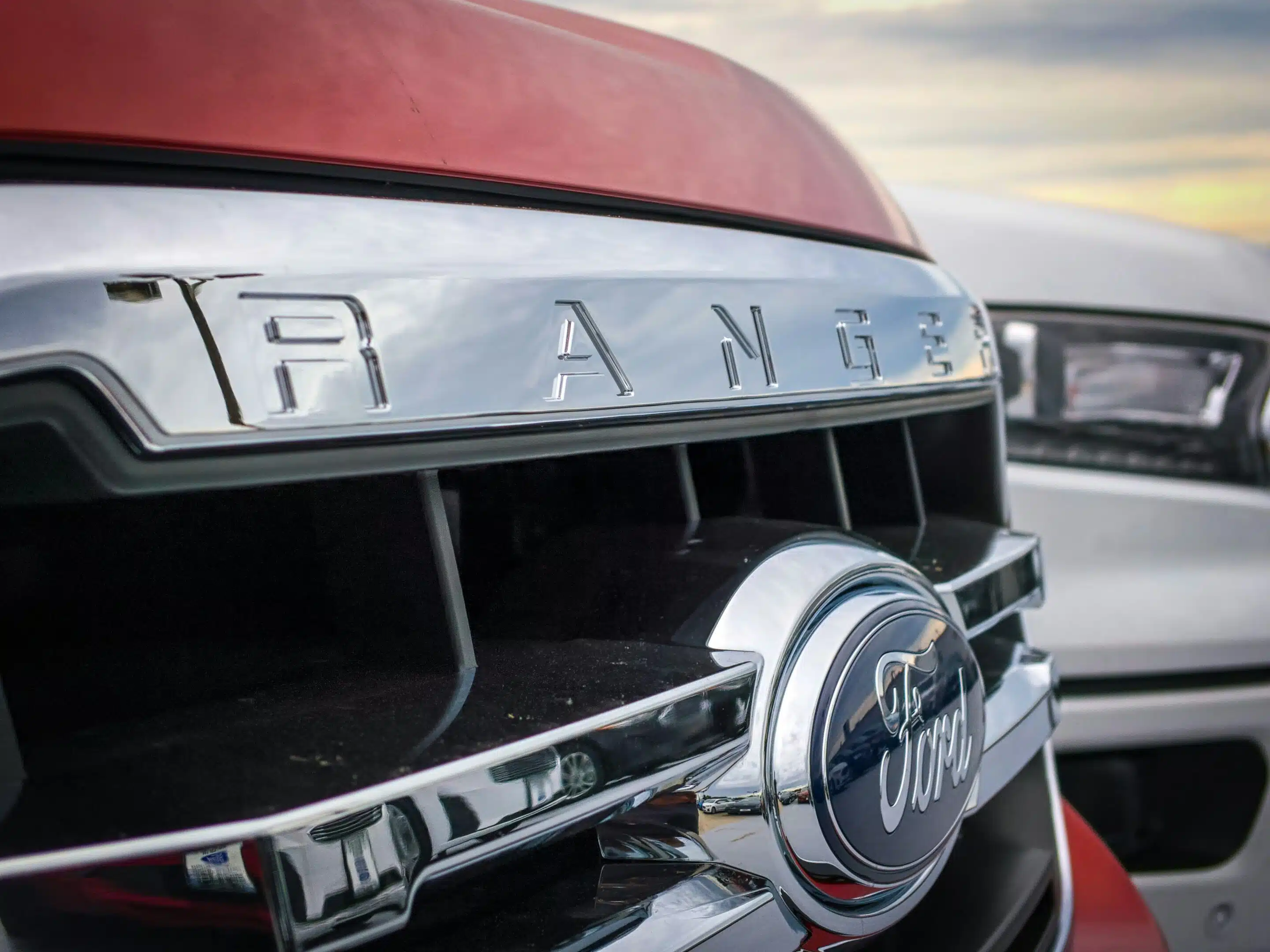 A Tesla Cybertruck owner threw a giant Yeti cooler at his truck, so a Ford Ranger owner did the same to compare what happens