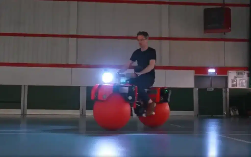 A YouTuber has created this unique omnidirectional bike that uses spheres in place of regular wheels, so it can balance and drift in any direction