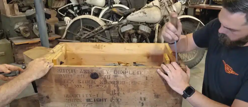 Motorcycle enthusiasts receive delivery of 1940s crate that's never been opened and take the gamble