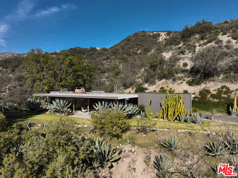 Flea's house is in the rugged hills.