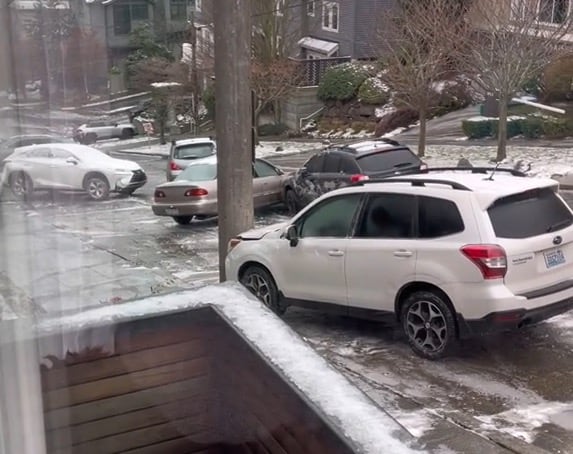 Parked cars on icy roads in Seattle