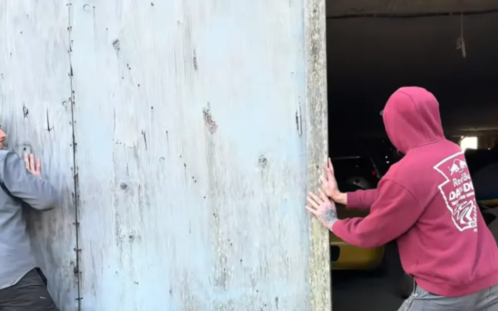 Woman enters a collapsing barn and finds an incredible Ferrari and Porsche surprise inside