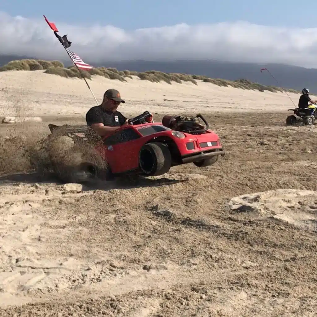 Guy put a motorcycle engine in a child's toy car and created a custom Porsche 911 GT3 'Power Wheel'