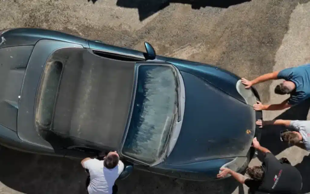 Mechanics revive a dusty Porsche Boxster S 986 after three years in a barn, uncovering rare green paint, hidden faults, and a flat-six that roars back to life