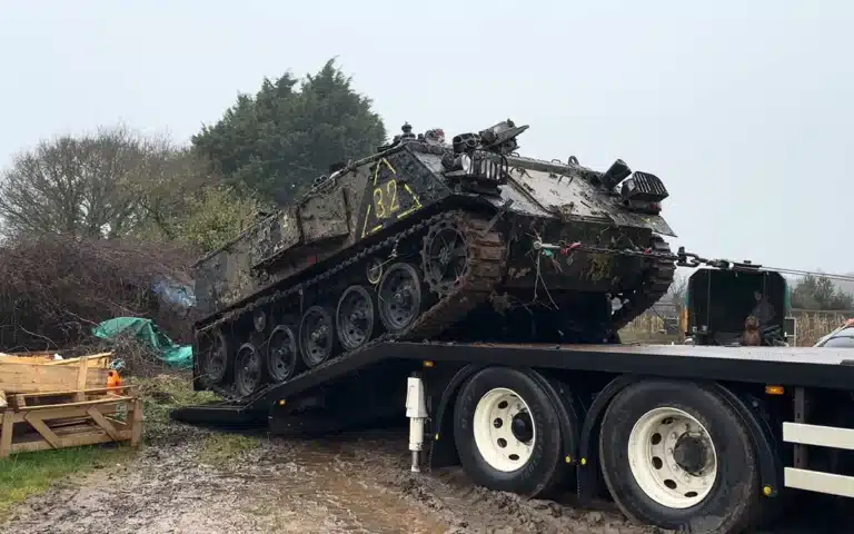 man rescues abandoned tank and starts it