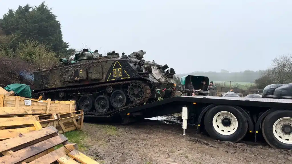 man rescues abandoned tank and starts it