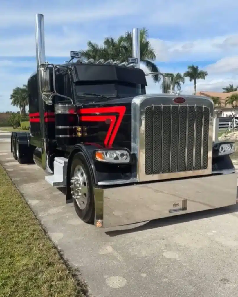 Rick Ross reacts to getting his semi-truck back after having it customized