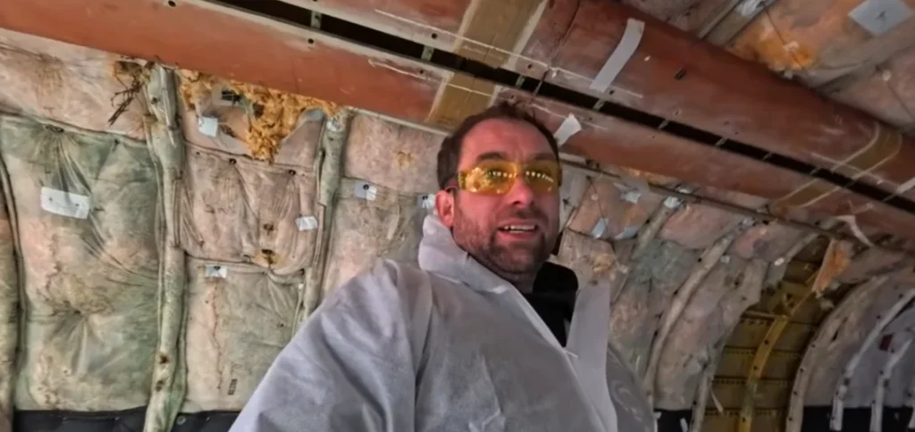 Man cutting up a Boeing 737 into a nuclear fallout shelter finds personal touches left inside plane 