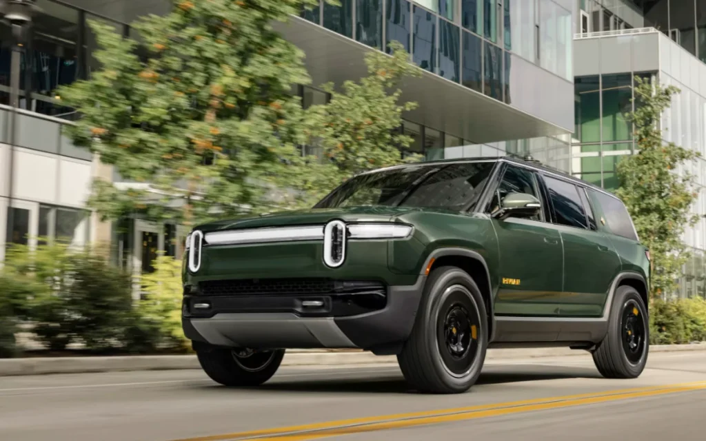 Rivian CEO RJ Scaringe said he made a very ‘intentional’ decision to differentiate his company from Tesla