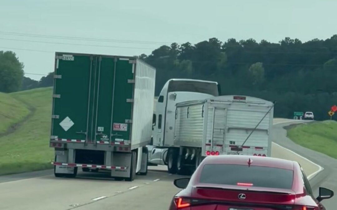 Two trucks try to force each other off the road in bizarre road rage incident