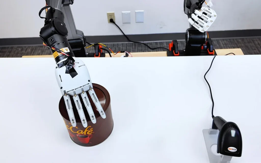 The $314 Aero Hand Open is an open-source robotic hand you can build yourself - it lifts phones, twists screws, and moves with human-like precision