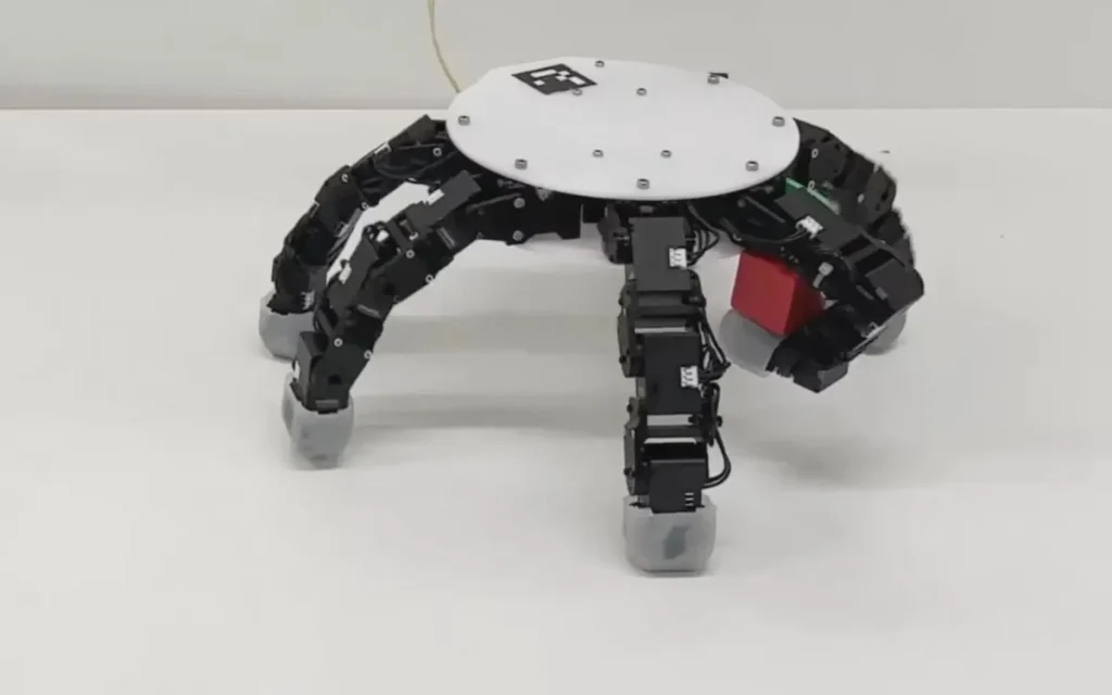 A creepy-cool robotic hand detaches from its arm, crawls like Thing from The Addams Family, and grabs objects all on its own