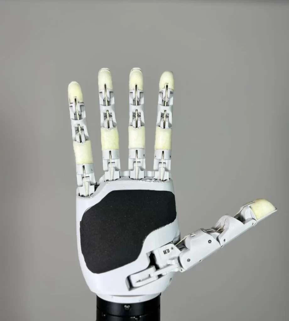 The $314 Aero Hand Open is an open-source robotic hand you can build yourself - it lifts phones, twists screws, and moves with human-like precision