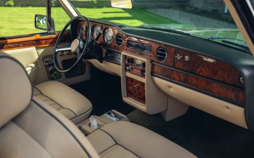 Check out this 1981 Rolls-Royce Corniche that has been completely customized to create a one-off grand tourer shooting brake with a hidden bike rack.