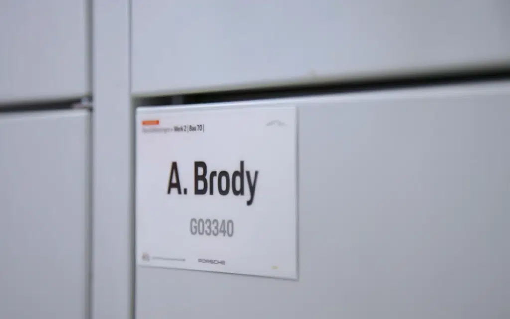 Adrien Brody steps into Porsche Stuttgart for The Intern documentary and learns there are no retakes on the factory floor