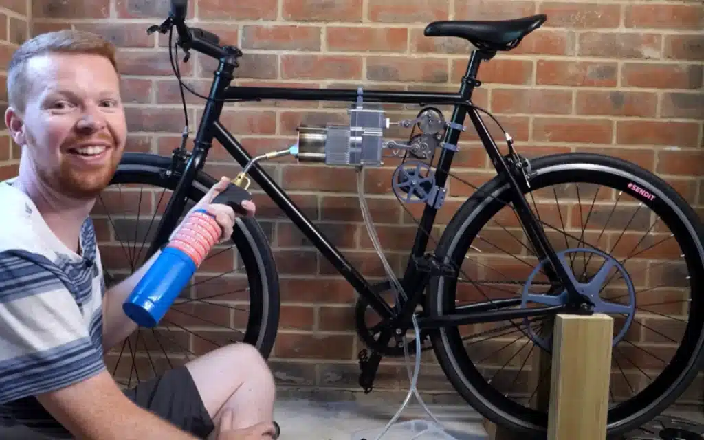 A YouTuber builds a working bike powered by a 200-year-old Stirling engine that runs off heat in an impressive feat of garage engineering