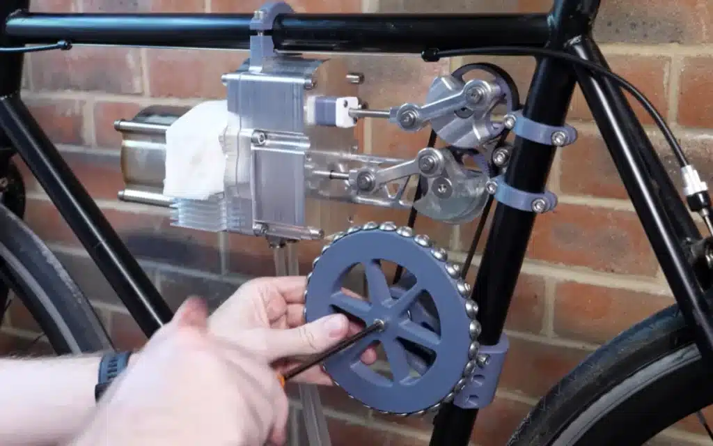 A YouTuber builds a working bike powered by a 200-year-old Stirling engine that runs off heat in an impressive feat of garage engineering