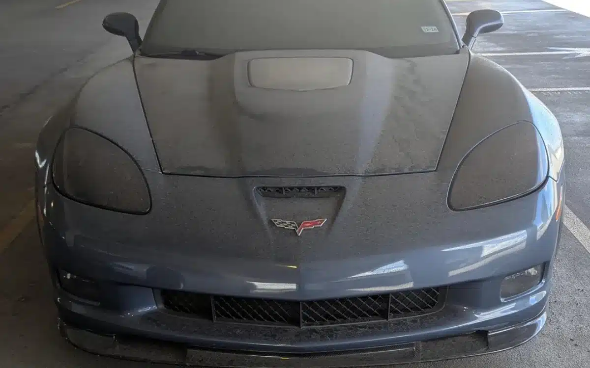 A Chevrolet Corvette ZR1 is abandoned and covered in dust in Texas parking garage causing huge mystery