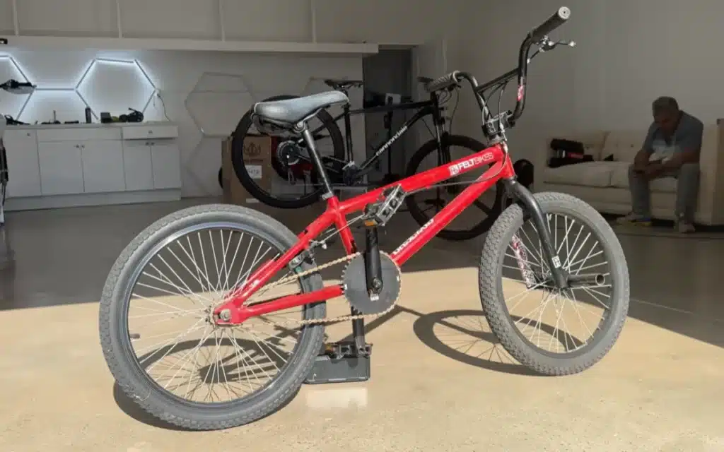 Watch a YouTuber's wild DIY e-bike experiment turn a $20 BMX into a 6,000-watt street rocket with hilariously chaotic results