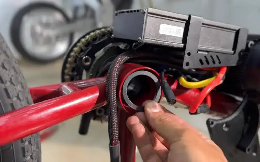Watch a YouTuber's wild DIY e-bike experiment turn a $20 BMX into a 6,000-watt street rocket with hilariously chaotic results