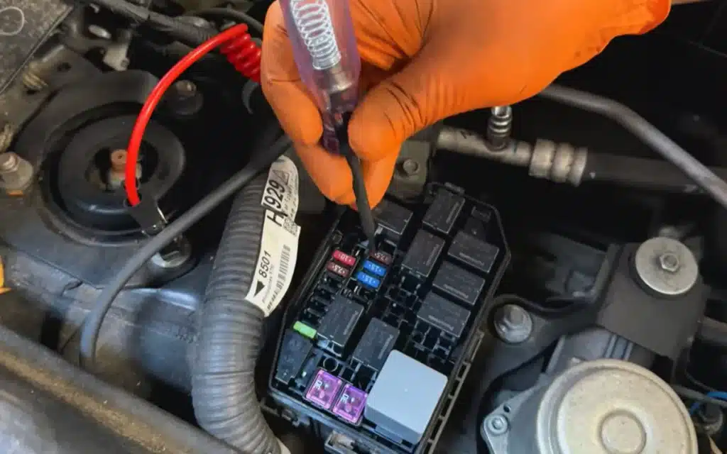 A mechanic brought a dead Mitsubishi Outlander PHEV back to life with a single $1 fuse, saving it from six months of abandonment and a trip to the junkyard