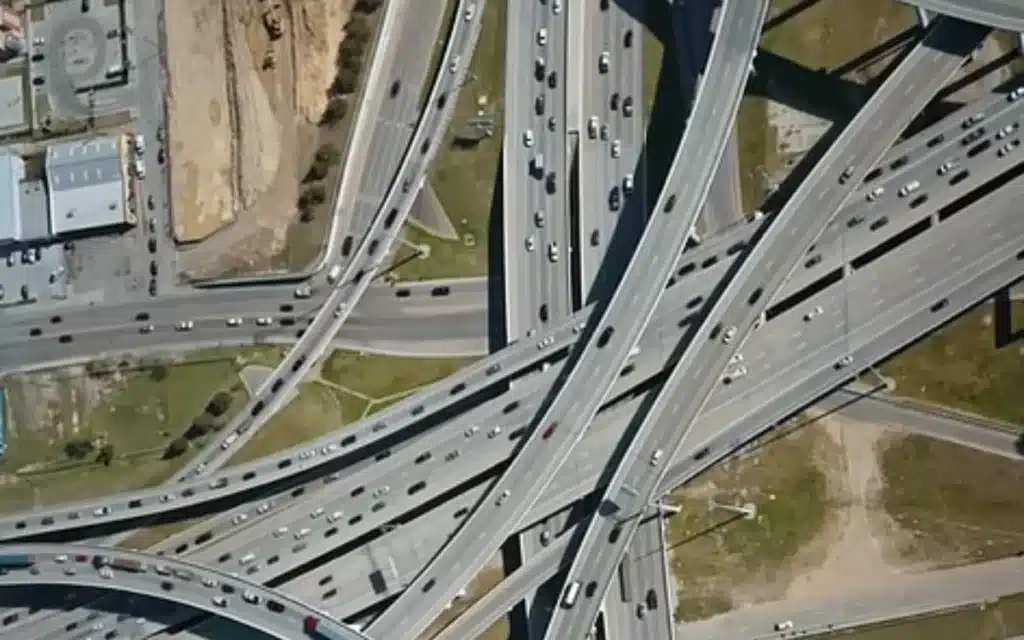 A viral YouTube video asks and answers whether adding more lanes could fix traffic, finding a 100-lane highway could halt delays, but at what cost