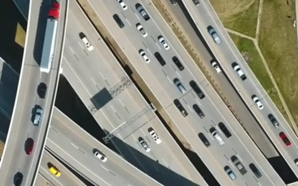 A viral YouTube video asks and answers whether adding more lanes could fix traffic, finding a 100-lane highway could halt delays, but at what cost