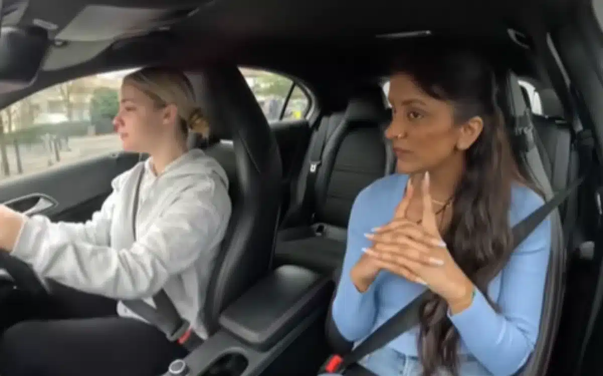 Learner driver confused after being told to keep going at red light