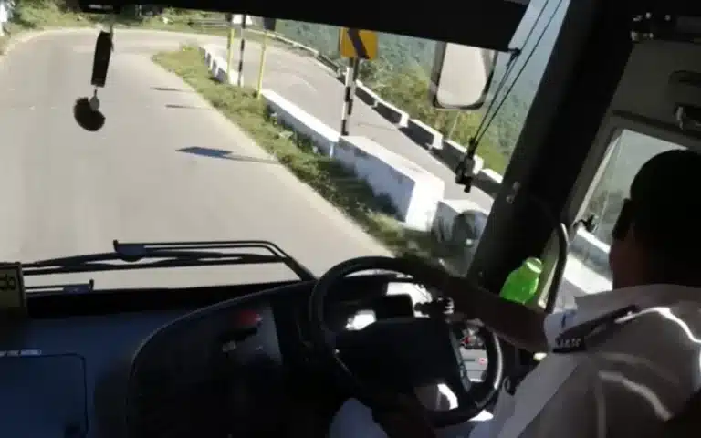 An Indian bus driver skillfully maneuvers through perilous hairpin bends with exceptional accuracy, leaving onlookers stunned