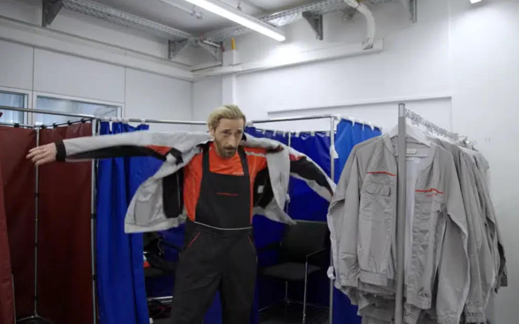 Adrien Brody steps into Porsche Stuttgart for The Intern documentary and learns there are no retakes on the factory floor