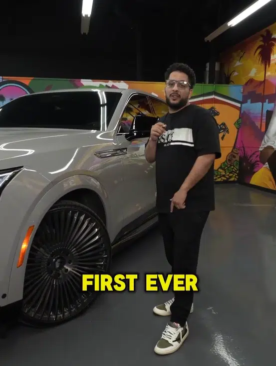 In the midst of selling cars, Shaq has a new Cadillac Escalade IQ and it's the first of its kind