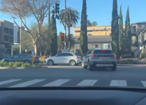 Man films what he claims is the quickest green light in LA after it lasts just three seconds at a West Hollywood intersection