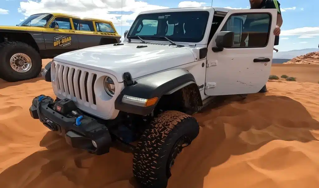 electric Jeep Wrangler stuck in Utah sand dunes