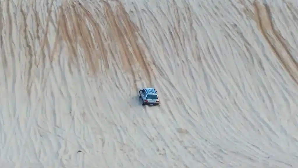 stock Subaru Forester climbs a hill that a heavy-duty truck failed at