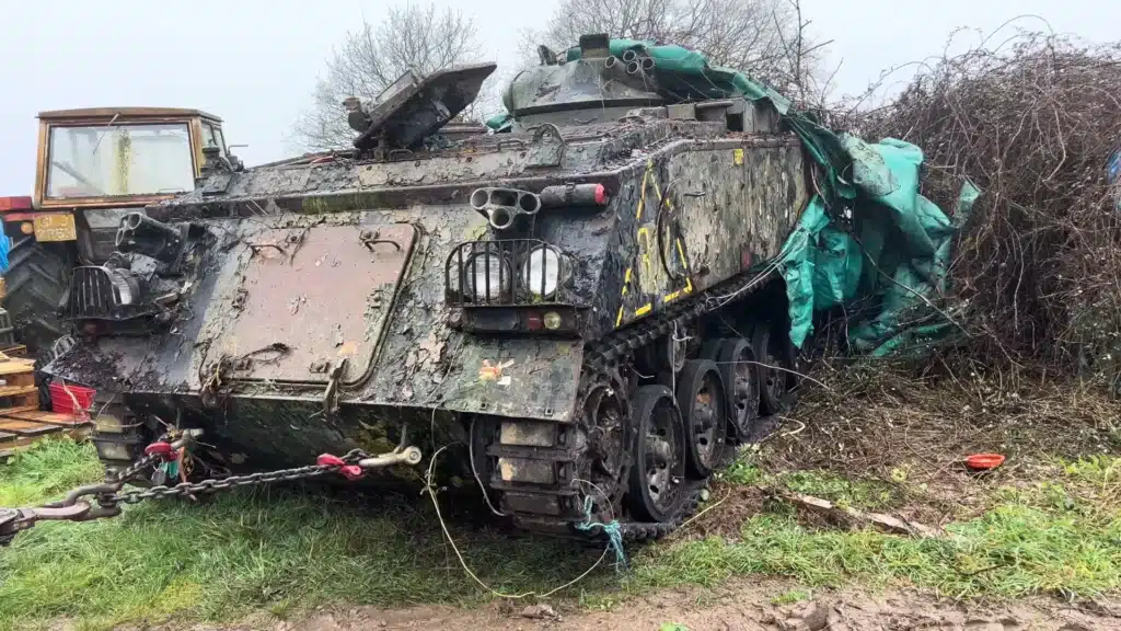 man rescues abandoned tank and starts it