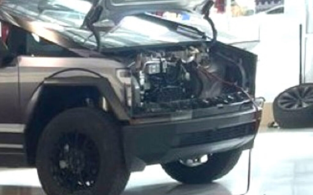 Photos of Tesla Cybertruck sporting Ford F-150-inspired wrap leaked online