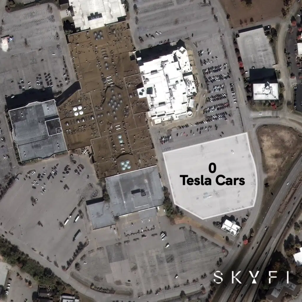 Tesla is storing so many unsold Teslas in America's parking lots you can allegedly see them from space