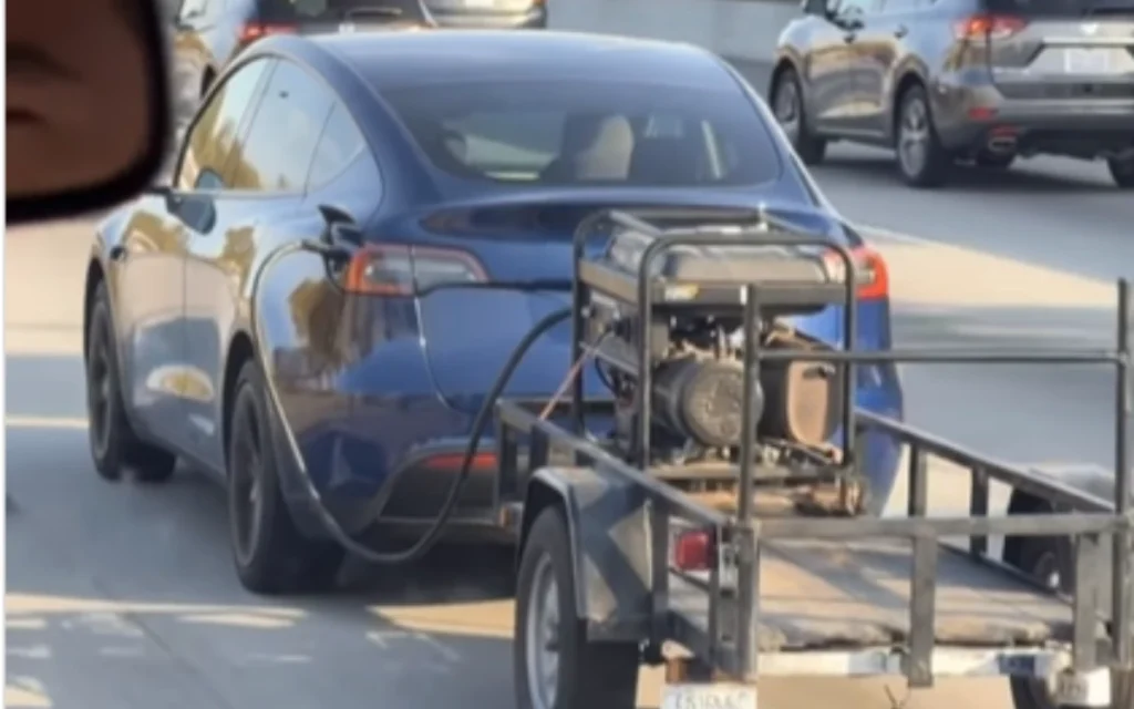 A viral clip showing what appeared to be a Tesla owner towing a generator behind his electric car quickly sparked a flood of jokes and discussions about range anxiety online.