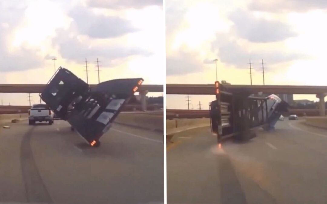 Tow truck flips while carrying a $100,000 Hummer