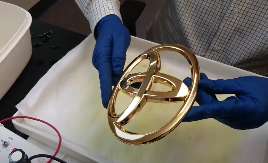 Watch these guys create a gleaming gold-plated Toyota badge in a process so precise and mesmerizing it feels like mechanical meditation