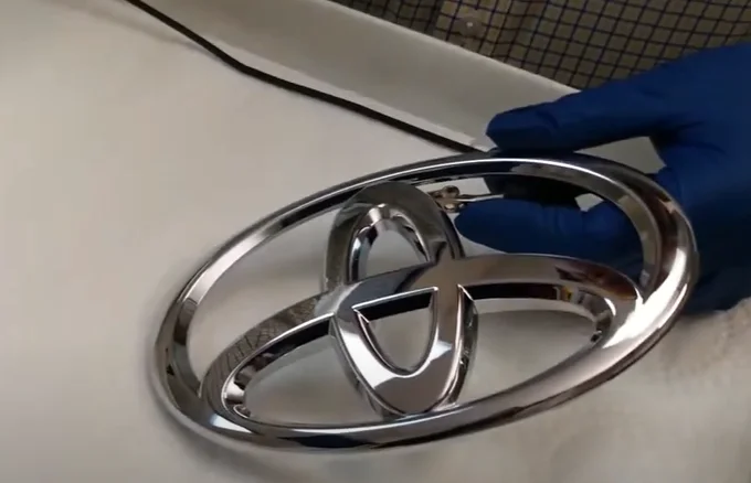Watch these guys create a gleaming gold-plated Toyota badge in a process so precise and mesmerizing it feels like mechanical meditation