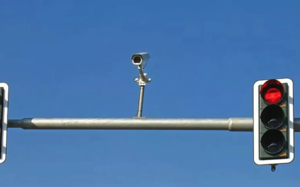 It turns out most of those little cameras on top of traffic lights in the US aren’t there just to catch red-light runners