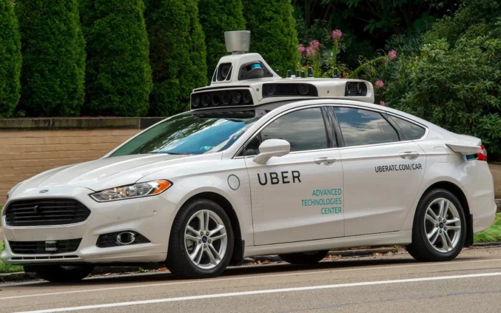 Uber is betting on self-driving cars to reshape transport, leaning on big partners and brand trust to outpace rivals like Tesla