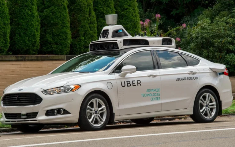 Uber is betting on self-driving cars to reshape transport, leaning on big partners and brand trust to outpace rivals like Tesla